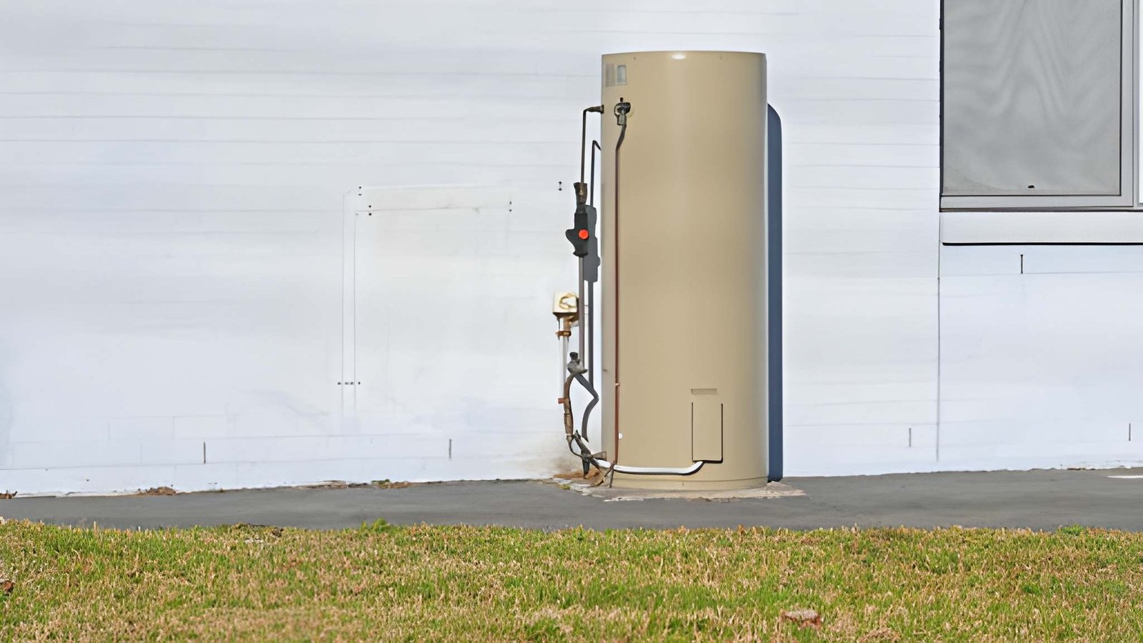 Electric hot water cylinder outside a Christchurch home